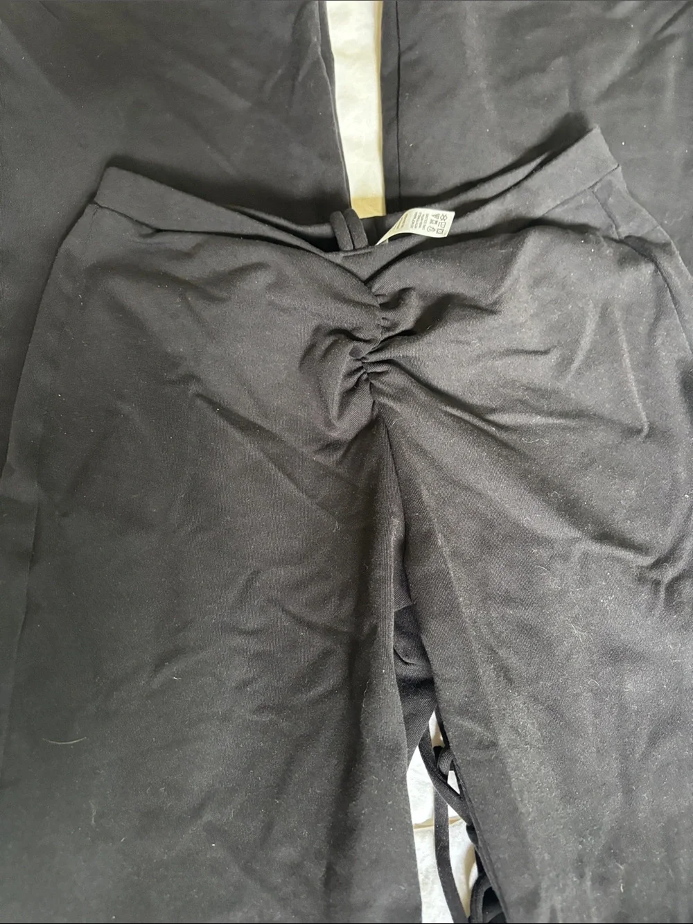 ALO Yoga Black Flare Leggings with Twist Waist